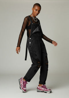 BubiniSegreti Rebecca White Sneaker in Violett und Beere mit Chunky-Sohle und Mesh-Details an einem Model