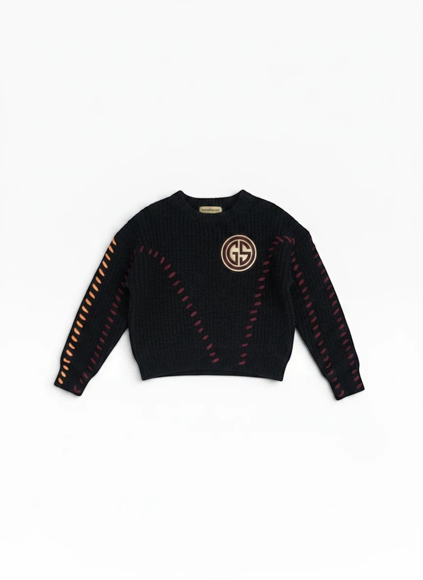 Schwarzer BubiniSegreti Strickpullover mit Rundhalsausschnitt, Logo-Emblem und farbigen Ziernähten an Ärmeln und Front.